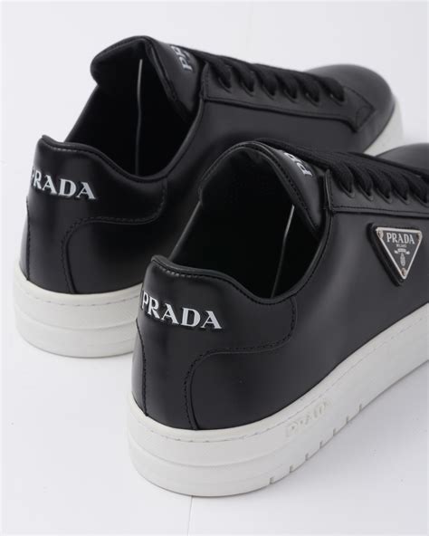 black mens prada sneaker with splash paint